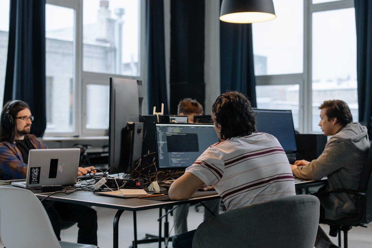 Cross-functional team collaborating on video data collection outsourcing strategy for AI training