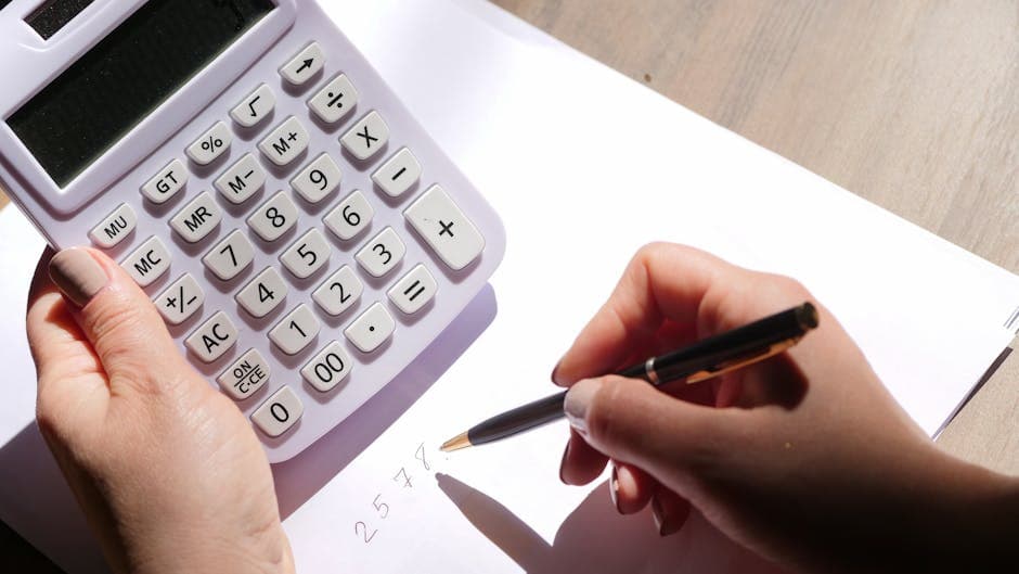 Calculator and ledger on a desk – modelling the true cost of bad training data and label errors in an enterprise AI budget